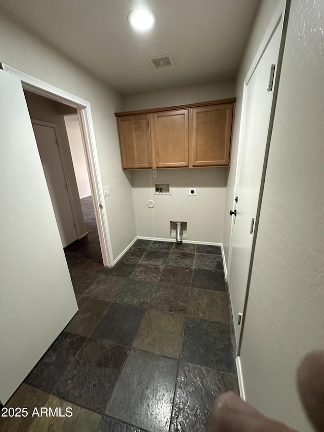 washroom with cabinets, hookup for a gas dryer, hookup for a washing machine, and electric dryer hookup