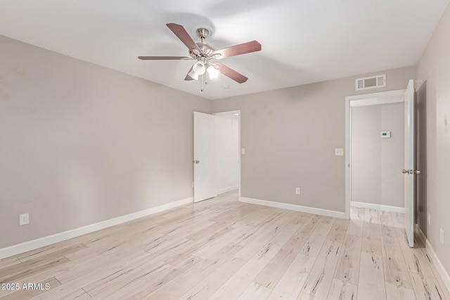 3119 W Cochise Dr Unit 111, Phoenix, AZ 85051 - unfurnished bedroom featuring light wood-style floors and baseboards