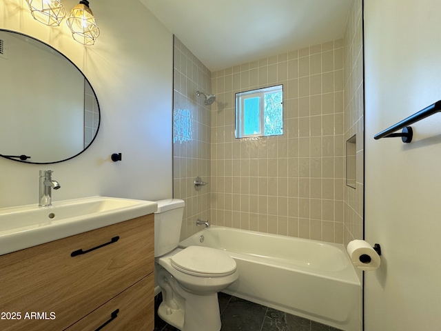 bathroom featuring vanity, tile patterned floors, toilet, and shower / washtub combination