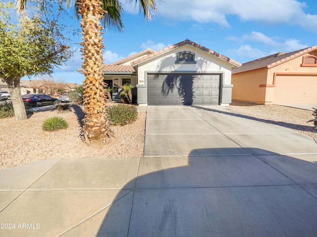 view of front of home with a garage