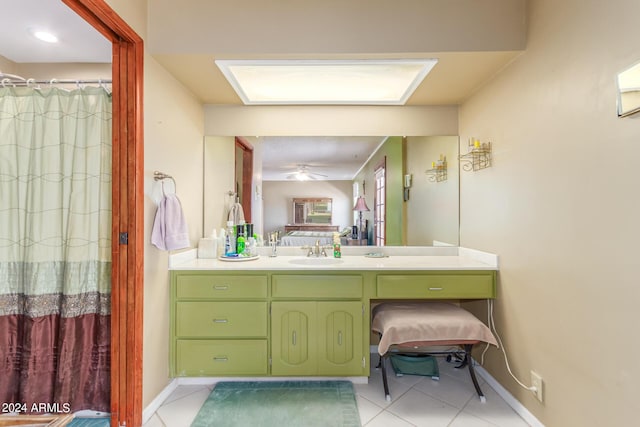 bathroom featuring vanity, tile patterned flooring, and ceiling fan