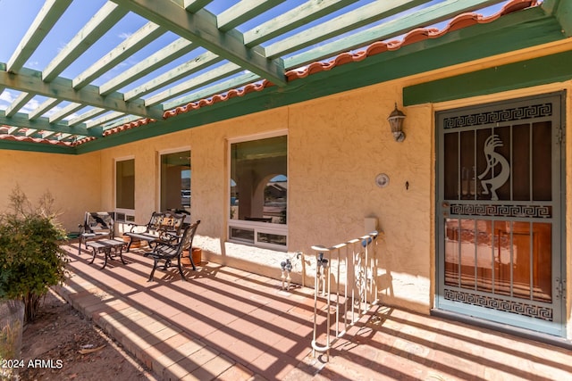 view of patio featuring a pergola