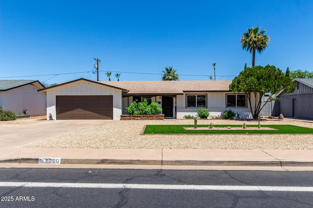 3050 E Cholla St E, Phoenix, AZ 85028 - single story home featuring an attached garage and concrete driveway