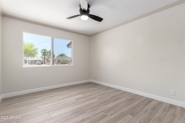 3050 E Cholla St E, Phoenix, AZ 85028 - unfurnished room featuring ornamental molding, light wood finished floors, and a ceiling fan