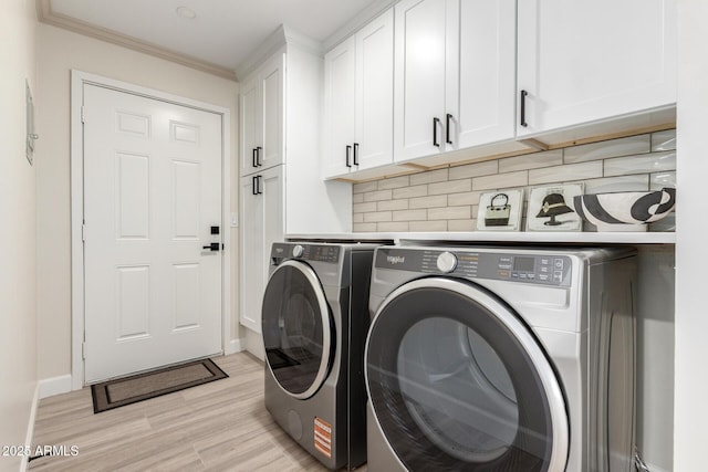3050 E Cholla St E, Phoenix, AZ 85028 - washroom featuring separate washer and dryer, cabinet space, light wood-style flooring, and ornamental molding