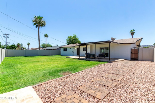 3050 E Cholla St E, Phoenix, AZ 85028 - back of house featuring a fenced backyard, a gate, and a patio