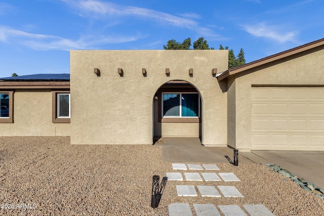 14215 N 36th Way, Phoenix, AZ 85032 - property entrance with solar panels and stucco siding