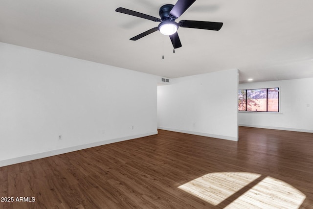 14215 N 36th Way, Phoenix, AZ 85032 - unfurnished room featuring wood finished floors, ceiling fan, and baseboards