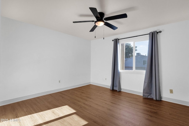 14215 N 36th Way, Phoenix, AZ 85032 - spare room with wood finished floors, a ceiling fan, and baseboards