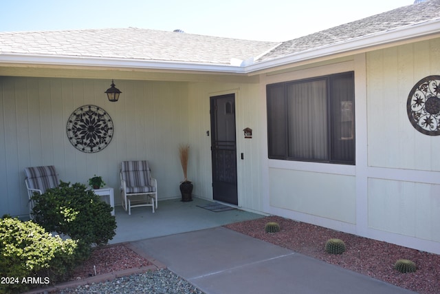 entrance to property featuring a patio