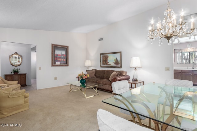 carpeted living room with lofted ceiling, sink, and a chandelier