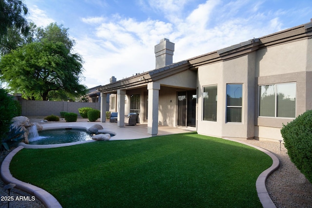14424 N 64th Pl, Scottsdale, AZ 85254 - back of property featuring stucco siding, a patio, and a chimney