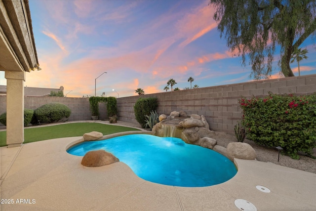 14424 N 64th Pl, Scottsdale, AZ 85254 - pool at dusk featuring a patio and a fenced backyard