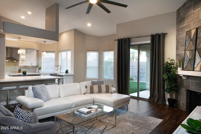 14424 N 64th Pl, Scottsdale, AZ 85254 - living room featuring dark wood-style flooring, ceiling fan, recessed lighting, and lofted ceiling