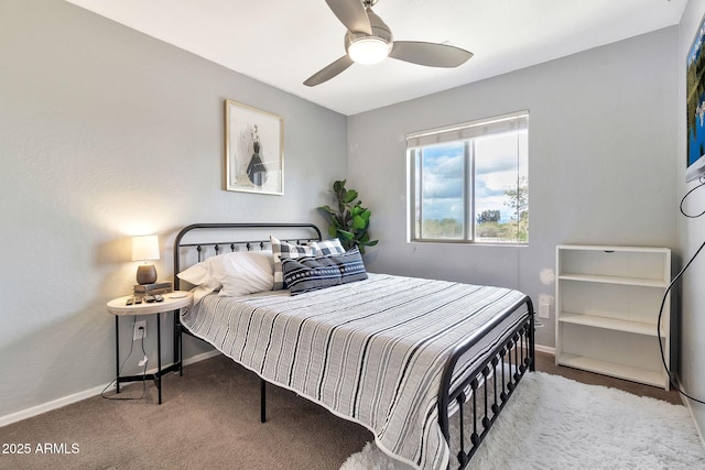 bedroom featuring baseboards, carpet, and a ceiling fan