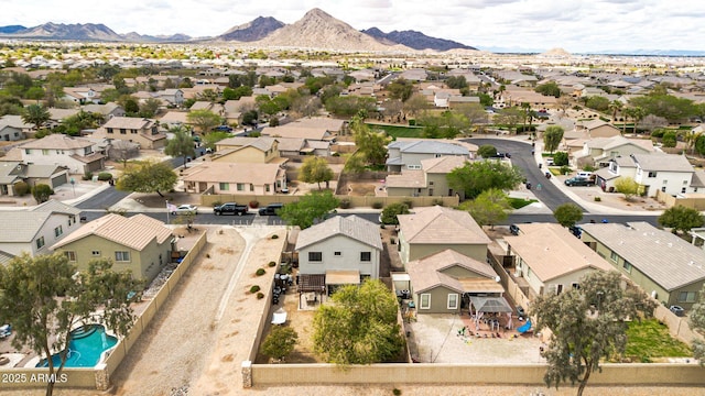 drone / aerial view featuring a mountain view and a residential view