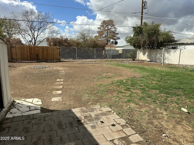 view of yard featuring a fenced backyard