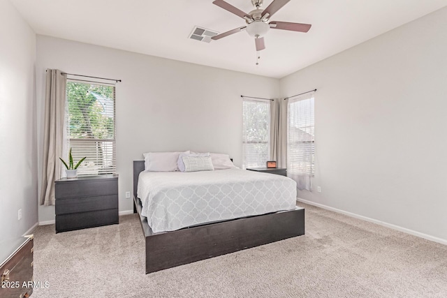 557 S Lemon Ct, Gilbert, AZ 85296 - carpeted bedroom featuring baseboards and a ceiling fan