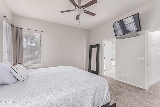 557 S Lemon Ct, Gilbert, AZ 85296 - bedroom with carpet, ceiling fan, and ensuite bath