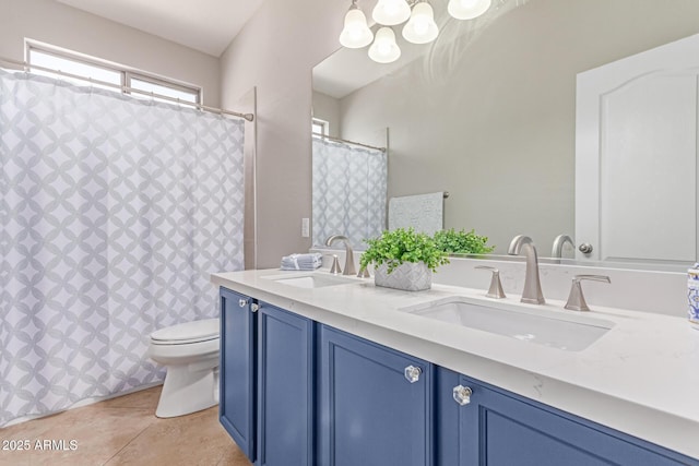 557 S Lemon Ct, Gilbert, AZ 85296 - full bath featuring double vanity, a chandelier, tile patterned floors, and a shower with shower curtain