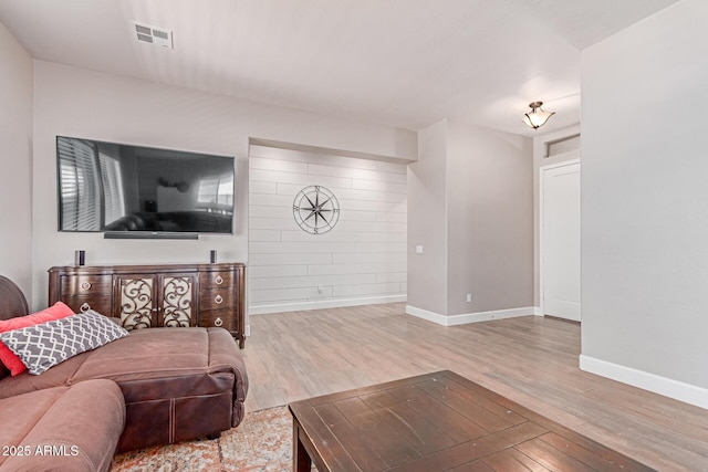 557 S Lemon Ct, Gilbert, AZ 85296 - living area featuring wood finished floors and baseboards