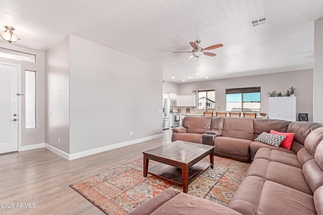 557 S Lemon Ct, Gilbert, AZ 85296 - living area featuring ceiling fan, light wood-style floors, and recessed lighting