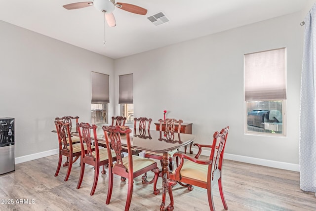 557 S Lemon Ct, Gilbert, AZ 85296 - dining space featuring wood finished floors and a ceiling fan