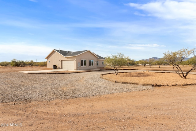 exterior space featuring a garage