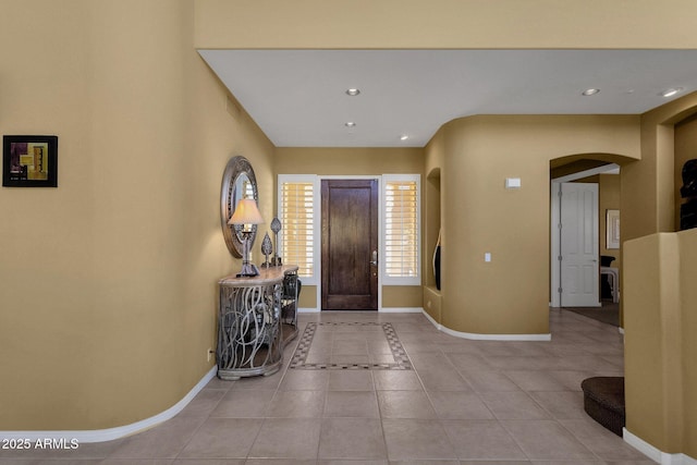 13827 N Mesquite Ln, Fountain Hills, AZ 85268 - tiled foyer entrance featuring arched walkways, baseboards, and recessed lighting