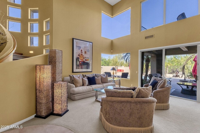 13827 N Mesquite Ln, Fountain Hills, AZ 85268 - living room featuring visible vents, baseboards, plenty of natural light, and carpet floors