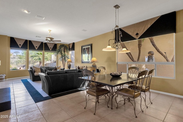 13827 N Mesquite Ln, Fountain Hills, AZ 85268 - dining room with baseboards, a ceiling fan, and light tile patterned flooring