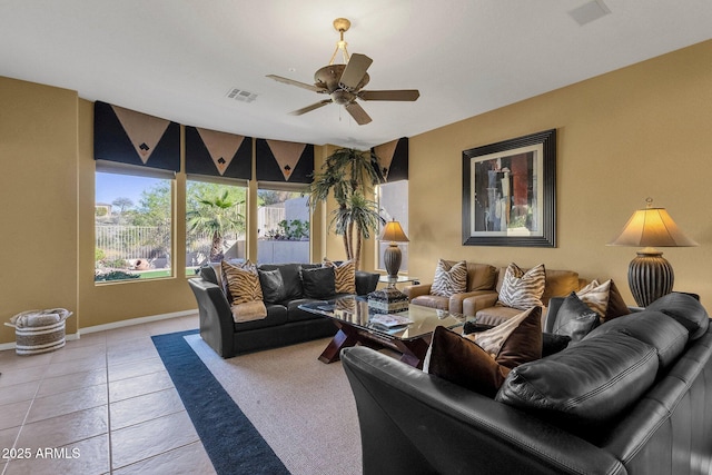 13827 N Mesquite Ln, Fountain Hills, AZ 85268 - living area with light tile patterned floors, ceiling fan, visible vents, and baseboards