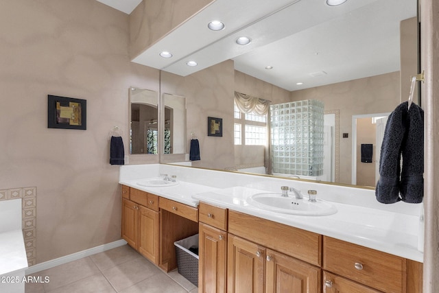 13827 N Mesquite Ln, Fountain Hills, AZ 85268 - bathroom with a sink, baseboards, double vanity, and tile patterned flooring