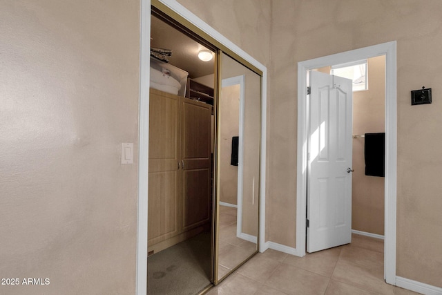 13827 N Mesquite Ln, Fountain Hills, AZ 85268 - hallway featuring light tile patterned floors and baseboards