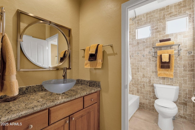 13827 N Mesquite Ln, Fountain Hills, AZ 85268 - bathroom with toilet, tile patterned flooring, tub / shower combination, and vanity