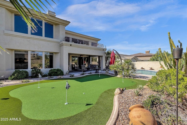 13827 N Mesquite Ln, Fountain Hills, AZ 85268 - exterior space with fence, a patio, stucco siding, a fenced in pool, and a balcony