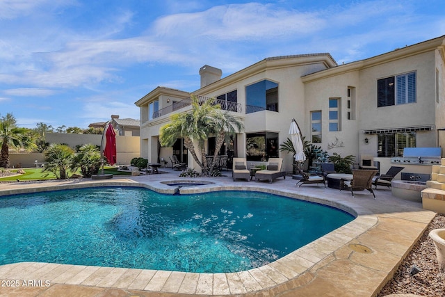 13827 N Mesquite Ln, Fountain Hills, AZ 85268 - view of swimming pool with exterior kitchen, a patio, an in ground hot tub, and a fenced in pool