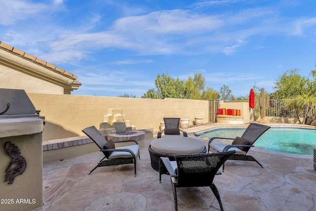 13827 N Mesquite Ln, Fountain Hills, AZ 85268 - view of patio with a fenced in pool, a fenced backyard, and an outdoor fire pit
