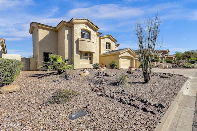 13827 N Mesquite Ln, Fountain Hills, AZ 85268 - mediterranean / spanish-style house with a garage and stucco siding