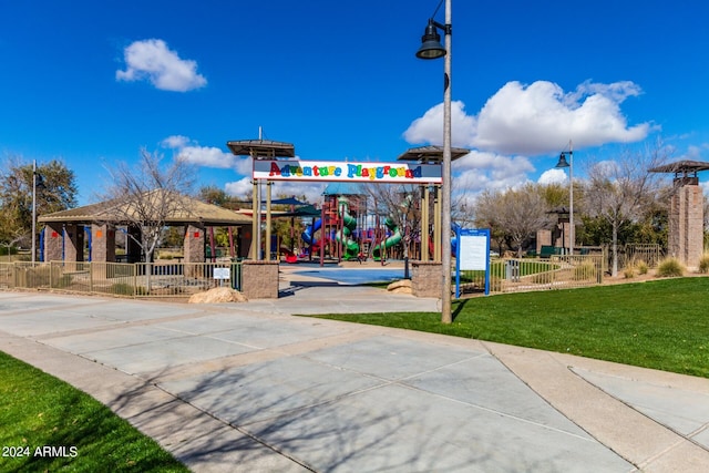 view of community with a lawn, a playground, and a gazebo