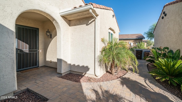 doorway to property featuring a patio