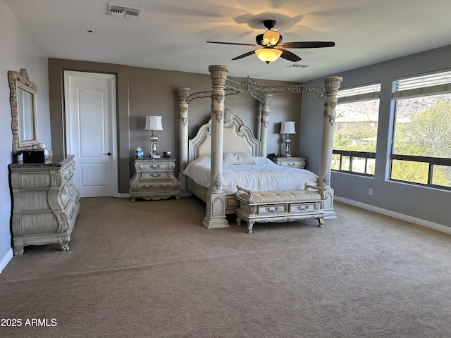 bedroom featuring baseboards, visible vents, carpet floors, and ceiling fan