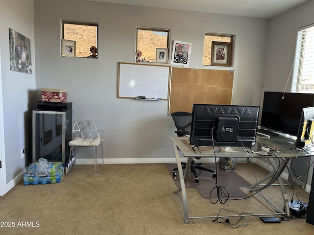 office with carpet and baseboards