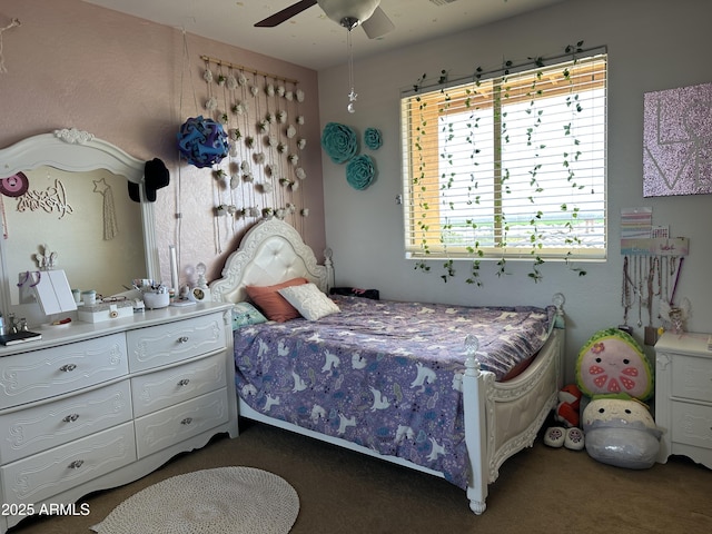 bedroom featuring a ceiling fan and carpet flooring