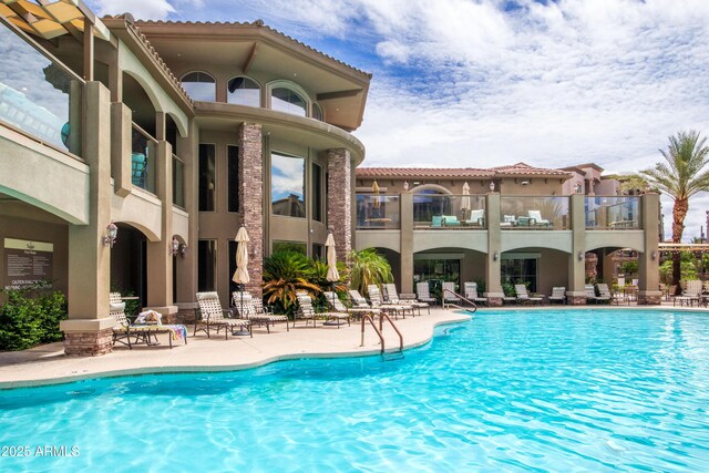 5450 E Deer Valley Dr Unit 1004, Phoenix, AZ 85054 - community pool with a patio