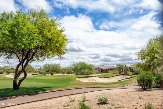 5450 E Deer Valley Dr Unit 1004, Phoenix, AZ 85054 - view of home's community with golf course view and a lawn