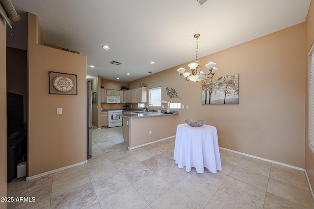 kitchen featuring visible vents, a peninsula, white appliances, recessed lighting, and a chandelier