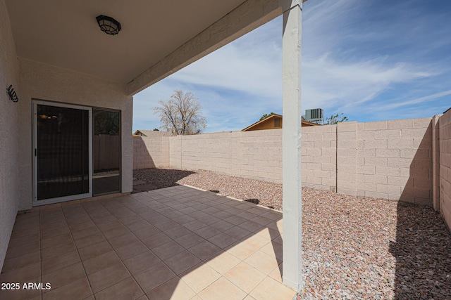 view of patio with central AC unit and a fenced backyard