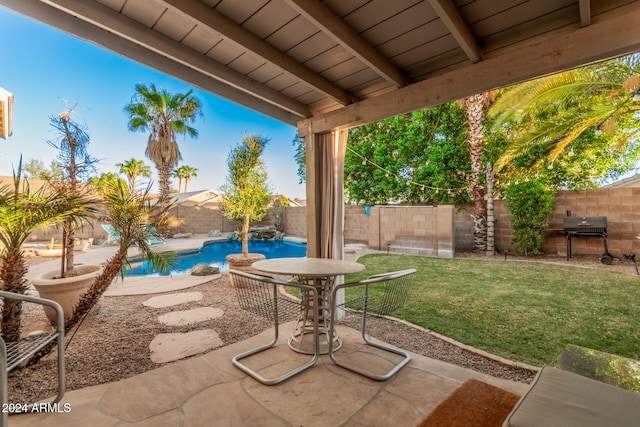 view of patio / terrace featuring a fenced in pool