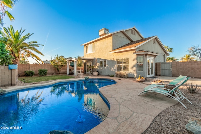 view of swimming pool with a patio